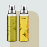 Set of 2 HomePuff borosilicate glass oil dispenser bottles with leak-proof caps and floral design, 500ml each